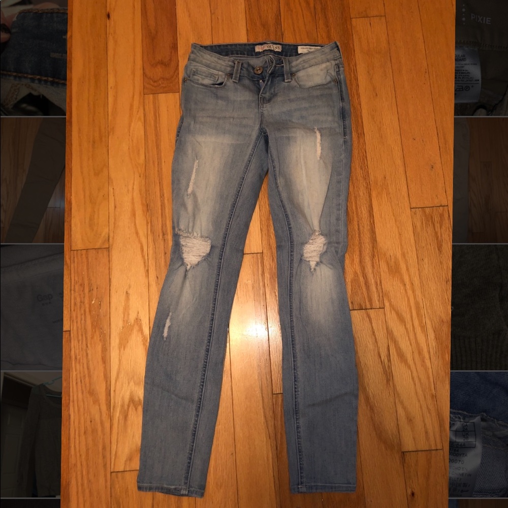Light washed distressed Jeans. Guess brand.